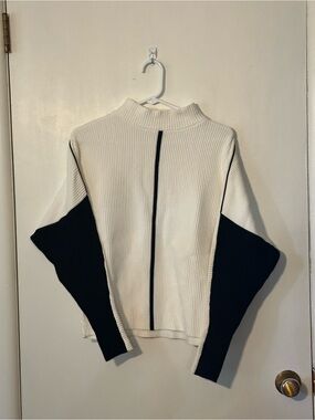 Philosophy women’s white ribbed mock-neck sweater with contrasting black sleeves